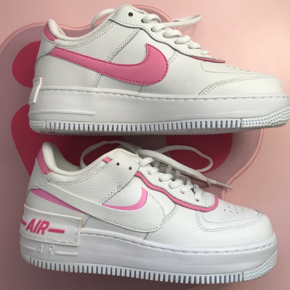 Pink and white sneakers